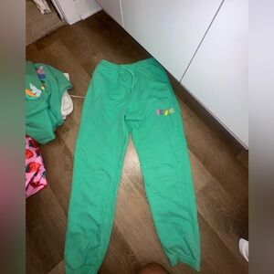 white fox green sweatpants with colorful detail